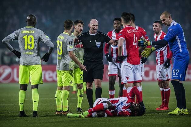7th December 2017, Rajko Mitic Stadium, Belgrade, Serbia, UEFA Europa League football, Red Star Belgrade versus FC Cologne; The referee gets between the Red star players and FC Kaln players  ActionPlus11959850
