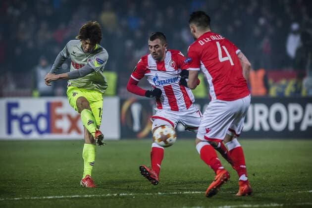 7th December 2017, Rajko Mitic Stadium, Belgrade, Serbia, UEFA Europa League football, Red Star Belgrade versus FC Cologne; Midfielder Damien Le Tallec of Red Star Belgrade and Midfielder Nenad Krsticic of Red Star Belgrade block the shoot from Forward Yuya Osako of FC Kaln  ActionPlus11959854