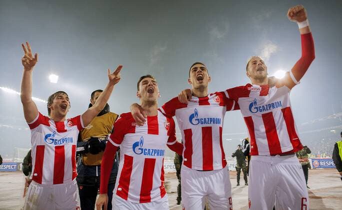 7th December 2017, Rajko Mitic Stadium, Belgrade, Serbia, UEFA Europa League football, Red Star Belgrade versus FC Cologne; Defender Filip Stojkovic, Defender Vujadin Savic and Midfielder Uros Racic of Red Star Belgrade celebrate the victory  ActionPlus11959863