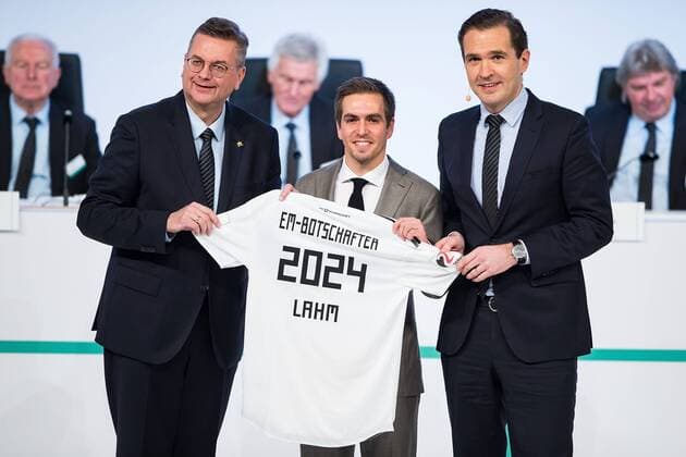 08 12 2017 xfux Football DFB Extraordinary DFB Bundestag 2017 emspor vl Former German national player Philip Lahm is unveiled as ambassador of the german UEFA EURO 2024 campaign by DFB President Reinhard Grindel and DFB General Secretary Friedrich Curtius R during the Extraordinary DFB Bundestag at Messe Frankfurt on December 8 2017 in Frankfurt Germany Frankfurt am Main