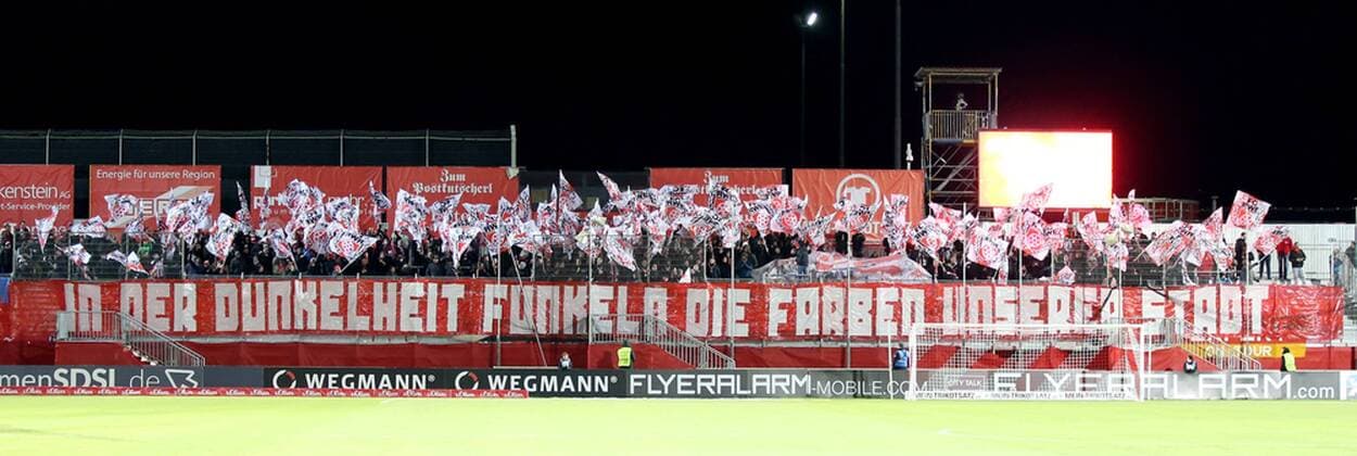 Germany Würzburg Flyeralarm Arena 08 12 2017 Football 3 Liga Wuerzburger Kickers Red White Erfurt Picture Choreo of the Erfurt fans The colors of our city sparkle in the darkness Copyright: HMBxMedia xHeikoxBecker
