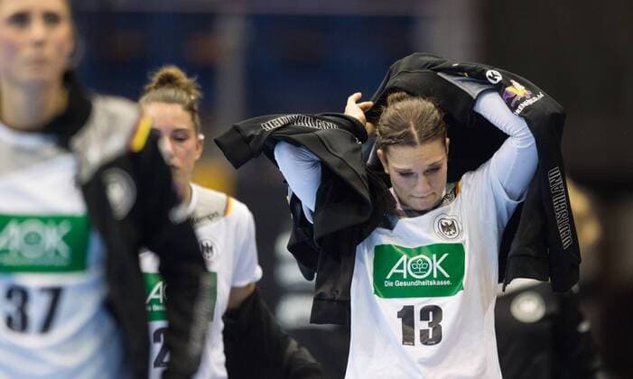 After the match has ended and the team leaves Germany Alicia STOLLE 37 GER Anna Loerper 10 GER and Julia Behnke 13 GER are going to play from the field Round of 16 Germany Denmark in Magdeburg on 10 12 2017 Handball 23 Women Handball World Cup in Germany 2017