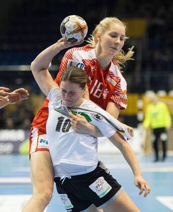 Mette Transborg 18 DEN stops Anna Loerper 10 GER Round of 16 Germany Denmark in Magdeburg on 10 12 2017 Handball 23 Women Handball World Cup in Germany 2017