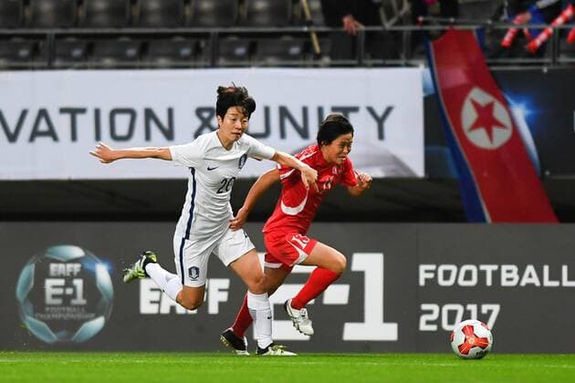 CHIBA, JAPAN - DECEMBER 11: Kim Phyong Hwa 13 of North Korea and Kim Hyeri 20 of South Korea compete for the ball during the EAFF E-1 Women s Football Championship between North Korea and South Korea at Fukuda Denshi Arena on December 11, 2017 in Chiba, Japan.  Copyright: xVCGx CFP111140541809 