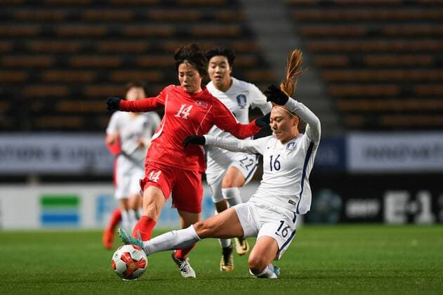 CHIBA, JAPAN - DECEMBER 11: Ri Hyang Sim 14 of North Korea and Jang Selgi 16 of South Korea compete for the ball during the EAFF E-1 Women s Football Championship between North Korea and South Korea at Fukuda Denshi Arena on December 11, 2017 in Chiba, Japan.  Copyright: xVCGx CFP111140541812 