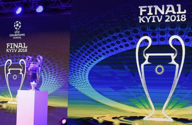 Fußball, CL, Finale-Logo wird in Kiew präsentiert December 12, 2017 - Kiev, Ukraine - The Champions League trophy and the logo of the 2018 UEFA Champions League final on display, during the presentation of the logo of the 2018 UEFA Champions League final in Kiev, Ukraine, on 12 December 2017. The UEFA Champions League final will be played at the Olimpiyskiy stadium in Kiev on 26 May 2018. Presentation of the logo of the 2018 UEFA Champions League final - ZUMAg194 20171212_zap_g194_009 Copyright: xSergxGlovnyx
