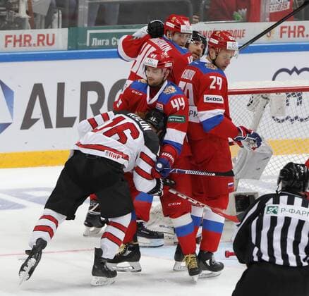 MOSCOW, RUSSIA â€“ DECEMBER 16, 2017: Canada s Brandon Kozun, Russiaâ€™s Yegor Yakovlev and Ilya Kablukov (L-R front) in their 2017-18 Euro Hockey Tour Channel One Cup Ice hockey Eishockey match at the VTB Ice Palace. Mikhail Japaridze TASS  TS06D692