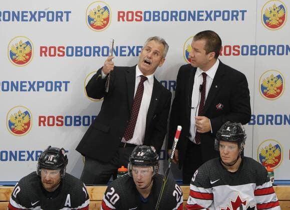 MOSCOW, RUSSIA â€“ DECEMBER 16, 2017: Willie Desjardins (L back), head coach of the Canadian national team Nationalteam in their 2017-18 Euro Hockey Tour Channel One Cup Ice hockey Eishockey match against Russia at the VTB Ice Palace. Mikhail Japaridze TASS  TS06D6A2