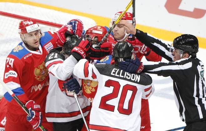 MOSCOW, RUSSIA â€“ DECEMBER 16, 2017: Russian and Canadian players fight in their 2017-18 Euro Hockey Tour Channel One Cup Ice hockey Eishockey match at the VTB Ice Palace. Mikhail Japaridze TASS  TS06D6A1