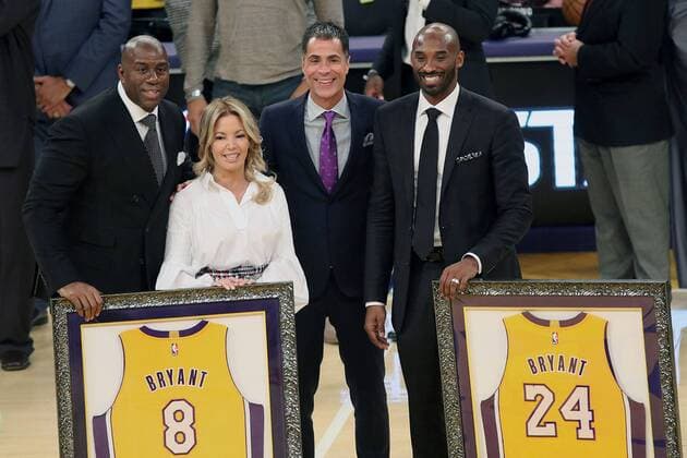 December 18, 2017 - Los Angeles, California, U.S - (L-R) Magic Johnson, Jeanie Buss, Rob Pelinka and Kobe Bryant pose during Kobe Bryant s jersey retirement ceremony at halftime of a basketball game between the Los Angeles Lakers and the Golden State Warriors at Staples Center on Monday December 18, 2017 in Los Angeles, California. Kobe Bryant s Jerseys are Retired - ZUMAp124 20171218_zaa_p124_029 Copyright: xBurtxHarrisx