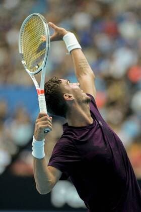 29th December 2017, Perth Arena, Perth, Australia; MasterCard Hopman Cup Tennis; Thanasi Kokkinakis of Team Australia serves to Roger Federer of Team Switzerland during their training session  ActionPlus11966003