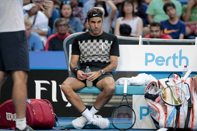29th December 2017, Perth Arena, Perth, Australia; MasterCard Hopman Cup Tennis; Roger Federer of Team Switzerland rests during his training session with Thanasi Kokkinakis of Team Australia  ActionPlus11966015