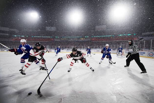 171229 United States s Trent Frederic and Dylan Samberg is challenging Canada s Jordan Kyrou and Dillon Dube during the ice hockey match between Canada and the United States in the JVM on 29 december 2017 in Buffalo  Copyright: JOELxMARKLUND BB171229JM077