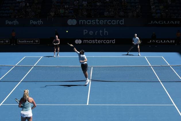 30th December 2017, Perth Arena, Perth, Australia; MasterCard Hopman Cup Tennis; Jack Sock of Team USA plays a back handed smash shot at the net during the mixed doubles against Team Russia Russia won 2-1  ActionPlus11966263