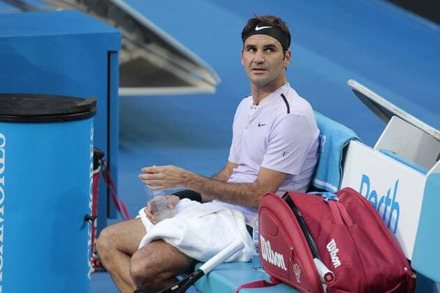 30th December 2017, Perth Arena, Perth, Australia; MasterCard Hopman Cup Tennis; Roger Federer of Team Switzerland watches the big screene during a break in play against Yuchi Sugita of Team Japan Federer won 2-0  ActionPlus11966356