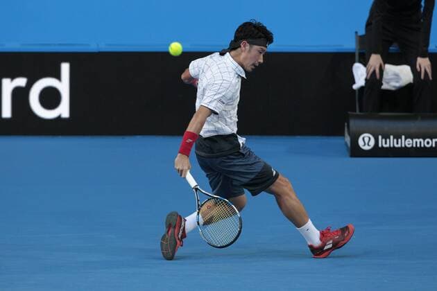 30th December 2017, Perth Arena, Perth, Australia; MasterCard Hopman Cup Tennis; Yuchi Sugita of Team Japan plays a backhand shot against Roger Federer of Team Switzerland Federer won 2-0  ActionPlus11966362