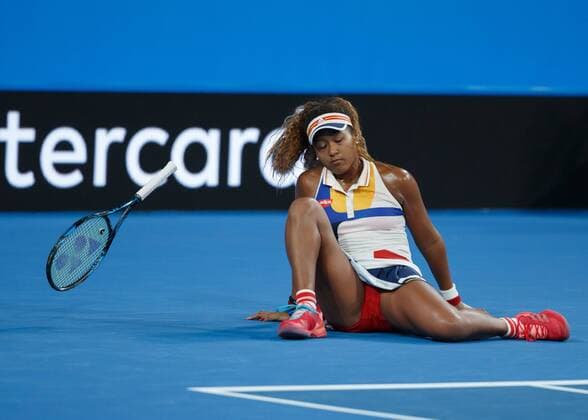 NAOMI OSAKA JPN slips and loses the bat Perth ITF Tennis Hopman Cup 2018 arena Perth Western Australia Australia 30 December 2017 Â Copyright: xJuergenxHasenkopfx
