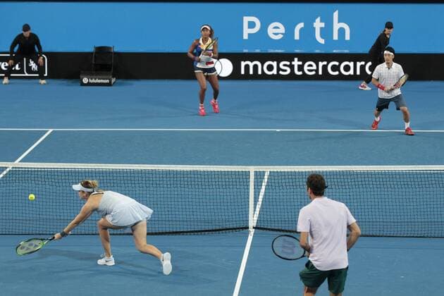 30th December 2017, Perth Arena, Perth, Australia; MasterCard Hopman Cup Tennis; Belinda Bencic of Team Switzerland volleys the ball at the net against Team Japan; Switzerland won 2 sets to 1  ActionPlus11966410