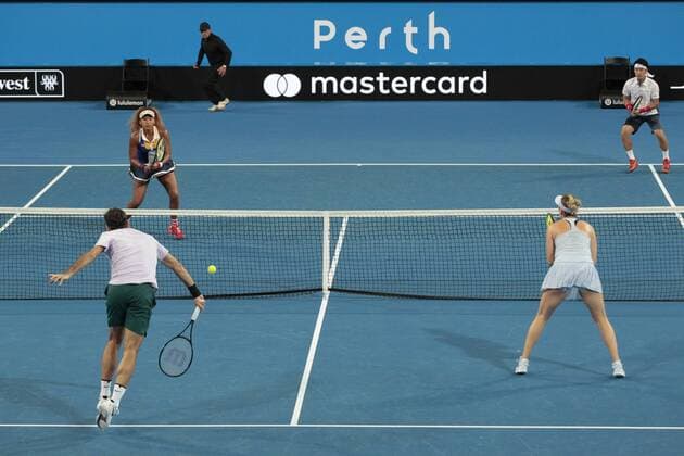30th December 2017, Perth Arena, Perth, Australia; MasterCard Hopman Cup Tennis; Roger Federer of Team Switzerland plays a half volley against Team Japan in the mixed doubles; Switzerland won 2 sets to 1  ActionPlus11966412