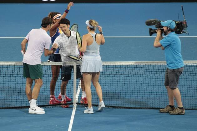 30th December 2017, Perth Arena, Perth, Australia; MasterCard Hopman Cup Tennis; Roger Federer and Belinda Bencic of Team Switzerland greet Naomi Osaka and Yuchi Sugita of Team Japan after they won their mixed doubles 2 sets to 1  ActionPlus11966416
