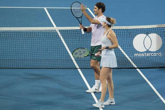 30th December 2017, Perth Arena, Perth, Australia; MasterCard Hopman Cup Tennis; Roger Federer and Belinda Bencic of Team Switzerland wave to the crowd after they defeated Japan in the mixed doubles 2-1  ActionPlus11966417