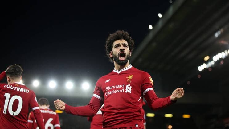 Mohamed Salah of Liverpooll celebrates his second goal during the English Premier League match at Anfield Stadium, Liverpool. Picture date: December 30th, 2017. Photo credit should read: Lynne Cameron Sportimage EDITORIAL USE ONLY. No use with unauthorised audio, video, data, fixture lists, club league logos or live services. Online in-match use limited to 120 images, no video emulation. No use in betting, games or single club league player publications.