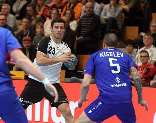 Winterthur Switzerland Eulachhallen 30 12 2017 men handball yellow Cup 2017 Switzerland vs Russia Patrick STREBEL Switzerland against Dimitri Kiselev RUS photo and all