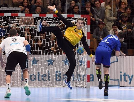Winterthur Switzerland Eulachhallen 30 12 2017 men handball yellow Cup 2017 Switzerland vs Russia Nikola PORTNER Switzerland holds up against Dmitry KOVALEV Russia photo and all