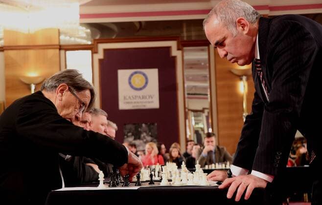 (171230) -- ZAGREB, Dec. 30, 2017 -- Russian chess grandmaster and former world champion Garry Kasparov (R) plays against former coach of Croatian national football team Miroslav Blazevic (L) during a simultaneous chess exhibition match in Zagreb, Croatia, on Dec. 29, 2017. ) (SP)CROATIA-ZAGREB-CHESS-KASPAROV ReljaxDusek 