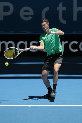 31st December 2017, Perth Arena, Perth, Australia; MasterCard Hopman Cup Tennis; Thanasi Kokkinakis of Team Australia plays a forehand shot Vasek Pospisil of Team Canada  ActionPlus11966811