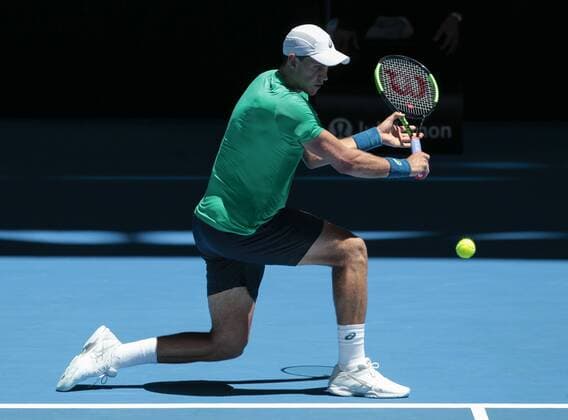 31st December 2017, Perth Arena, Perth, Australia; MasterCard Hopman Cup Tennis; Vasek Pospisil of Team Canada plays a backhand shot against Thanasi Kokkinakis of Team Australia  ActionPlus11966815
