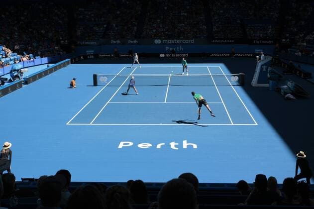 31st December 2017, Perth Arena, Perth, Australia; MasterCard Hopman Cup Tennis; tThanasi Kokkinakis of Team Australia serves during the mixed doubles against Canada Canada won 2-0  ActionPlus11966829