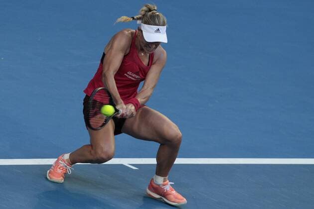 1st January 2018, Perth Arena, Perth, Australia; MasterCard Hopman Cup Tennis; Angelique Kerber of Team Germany gets low to play a backhand shot against Elise Mertens of Team Belgium Kerber won 2 sets to 0  ActionPlus11967102