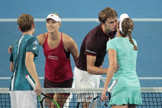 1st January 2018, Perth Arena, Perth, Australia; MasterCard Hopman Cup Tennis; David Goffin (L) and Elise Mertens (R) of Team Belgium congratulate Germanys Angelique Kerber (L) and Alexander Zverev (R) after they won the mixed doubles 2 sets to 0  ActionPlus11967240