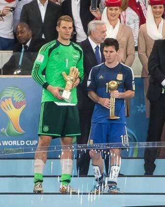 July 13, 2014 - Rio De Janeiro, Brazil - Rio de Janeiro, Brazil - Sunday, July 13, 2014: Germany defeated Argentina 1-0 in extra time to win the 2014 World Cup Final match at Estadio MaracanÃ Lionel Messi and Manuel Neuer after receiving the Golden Ball and Golden Glove award - ZUMAt139 20140713_zaa_t139_049 Copyright: xStevenxLimentanix