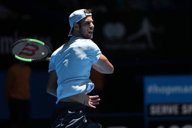 (180104) -- PERTH, Jan. 4, 2018 -- Karen Khachanov of Russia returns the ball during the match between Russia and Japan at Hopman Cup mixed teams tennis tournament in Perth, Australia, Jan. 4, 2018. Russia won 2-1. ) (SP)AUSTRALIA-PERTH-TENNIS-HOPMAN CUP ZhouxDan 