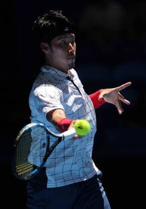 (180104) -- PERTH, Jan. 4, 2018 -- Yuichi Sugita of Japan returns a shot during the match between Russia and Japan at Hopman Cup mixed teams tennis tournament in Perth, Australia, Jan. 4, 2018. Russia won 2-1. ) (SP)AUSTRALIA-PERTH-TENNIS-HOPMAN CUP ZhouxDan 