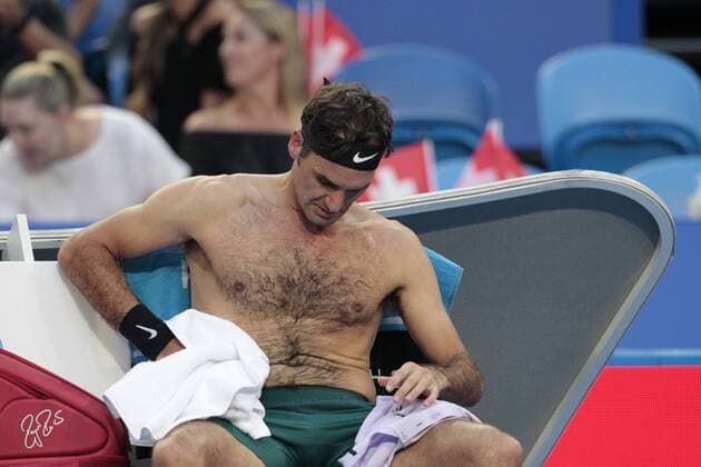 4th January 2018, Perth Arena, Perth, Australia; MasterCard Hopman Cup Tennis; Roger Federer of Team Switzerland changes shirts during his match against Jack Sock of Team USA  ActionPlus11967987