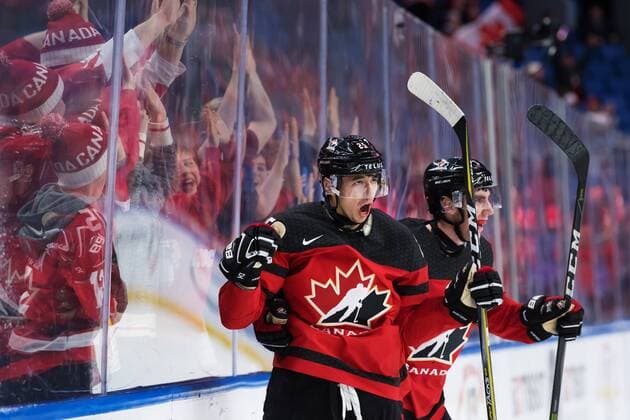 180104 Canada s Jordan Kyrou and Conor Timmins exults after 5 1 minced during ice hockey semifinal Canada pa between JVM and Czech Republic 4 January 2018 in Buffalo  Copyright: JOELxMARKLUND BB180104JM073