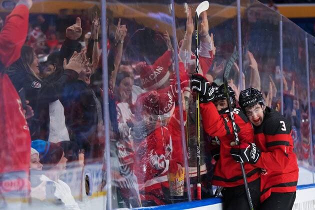 180104 Canada s Jordan Kyrou and Conor Timmins exults after 5 1 minced during ice hockey semifinal Canada pa between JVM and Czech Republic 4 January 2018 in Buffalo  Copyright: JOELxMARKLUND BB180104JM077