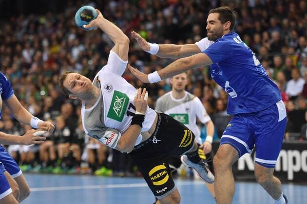 Steffen WEINHOLD GER jump shot action battle against Arnar GUNNARSSON ISL handball match Germany Iceland on 05 01 2018 P O R S C H E A R E N A Stuttgart