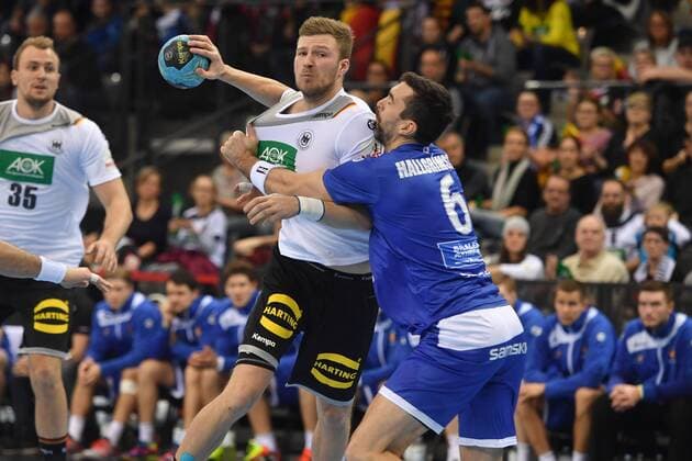Philipp WEBER GER jump shot action battle against Ásgeir HALLGRÍMSSON ISL handball match Germany Iceland on 05 01 2018 P O R S C H E A R E N A Stuttgart
