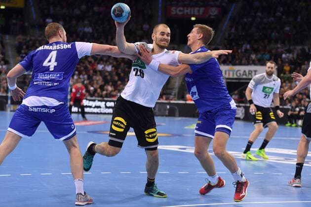 Maximilian JANKE GER action battle against Aron PALMARSSON ISL li and Oelafur GUOMUNDSSON ISL jump shot handball match Germany Iceland on 05 01 2018 P O R S C H E A R E N A Stuttgart