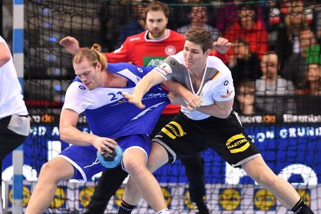 Finn LEMKE GER action battle against Arnar ARNARSSON ISL handball match Germany Iceland on 05 01 2018 P O R S C H E A R E N A Stuttgart
