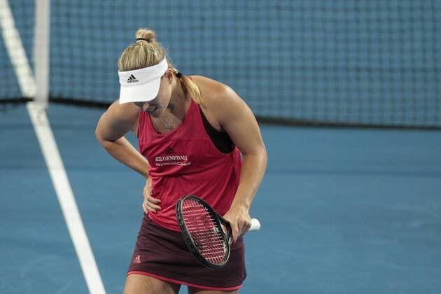 5th January 2018, Perth Arena, Perth, Australia; MasterCard Hopman Cup Tennis; Angelique Kerber of Team Germany doubles over in pain after being hit with the ball by Thanasi Kokkinakis of Team Australia in the mixed doubles on day 7 of the Hopman Cup  ActionPlus11968327