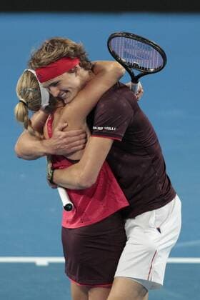5th January 2018, Perth Arena, Perth, Australia; MasterCard Hopman Cup Tennis; Angelique Kerber of Team Germany and Alexander Zverev hug after beating Australia in the mixed doubles and qualifying for the Final against Switzerland  ActionPlus11968333