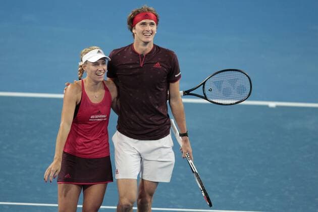 5th January 2018, Perth Arena, Perth, Australia; MasterCard Hopman Cup Tennis; Angelique Kerber of Team Germany and Alexander Zverev hug after beating Australia in the mixed doubles and qualifying for the Final against Switzerland  ActionPlus11968334
