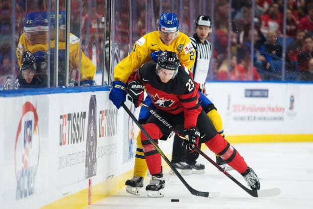 180105 Sweden s Jesper Boqvist and Canada s Sam Steel in a melee during the ice hockey final between Sweden pa JVM and Canada on 5 January 2018 in Buffalo  Copyright: JOELxMARKLUND BB180105JM028