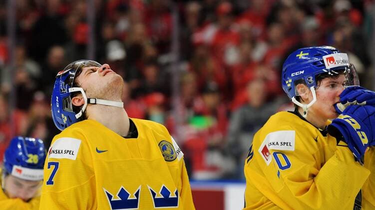 180105 Sweden s Timothy Liljegren and Isac Lafon moping around after losing finals in Sweden ice hockey WORLD JUNIOR CHAMPIONSHIPS between pa and Canada on 5 January 2018 in Buffalo  Copyright: JOELxMARKLUND BB180105JM067