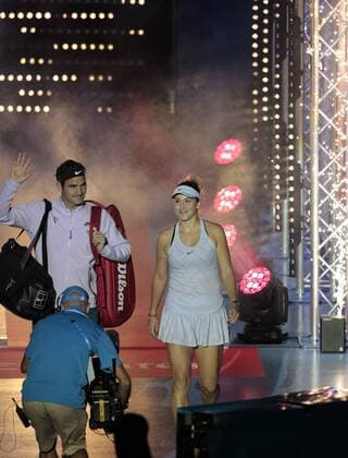 6th January 2018, Perth Arena, Perth, Australia; MasterCard Hopman Cup Tennis Final; Roger Federer and Belinda Bencic of Team Switzerland make their way to center court before the start of the HopmanCup Final  ActionPlus11968553